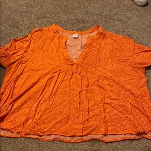orange flowered shirt